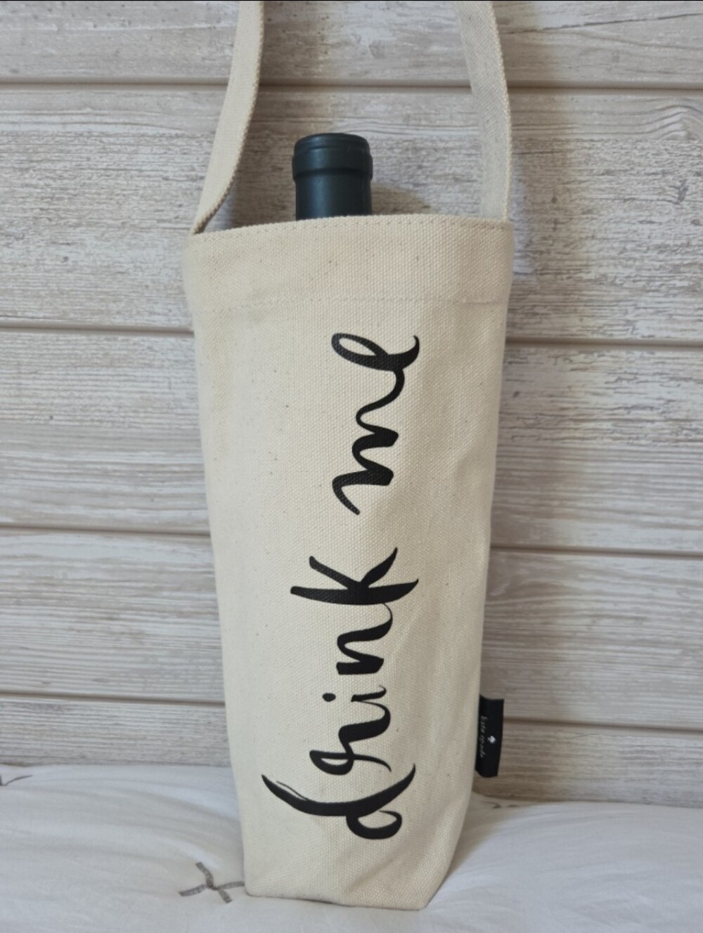 kate spade Cream Canvas Wine Tote with Black Script